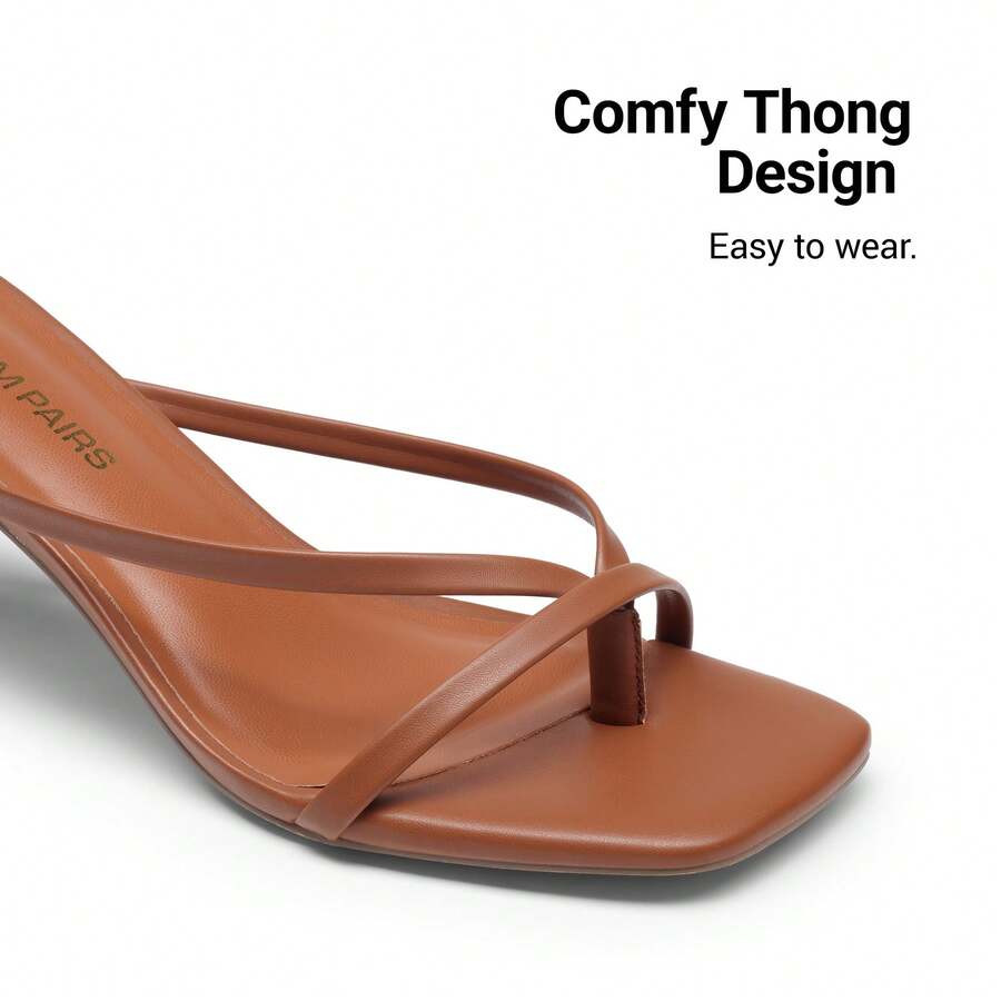 Women's metallic kitten low heel thong sandals featuring an open square toe and slip-on mule design.