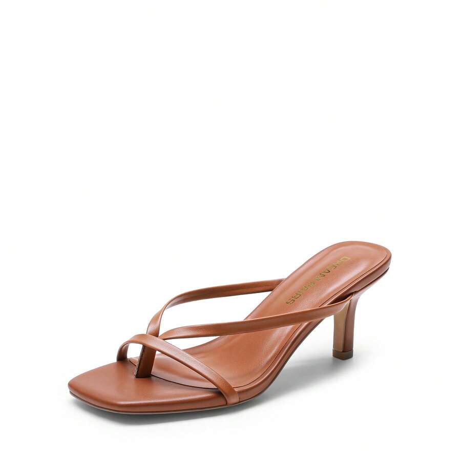 Women's metallic kitten low heel thong sandals featuring an open square toe and slip-on mule design.
