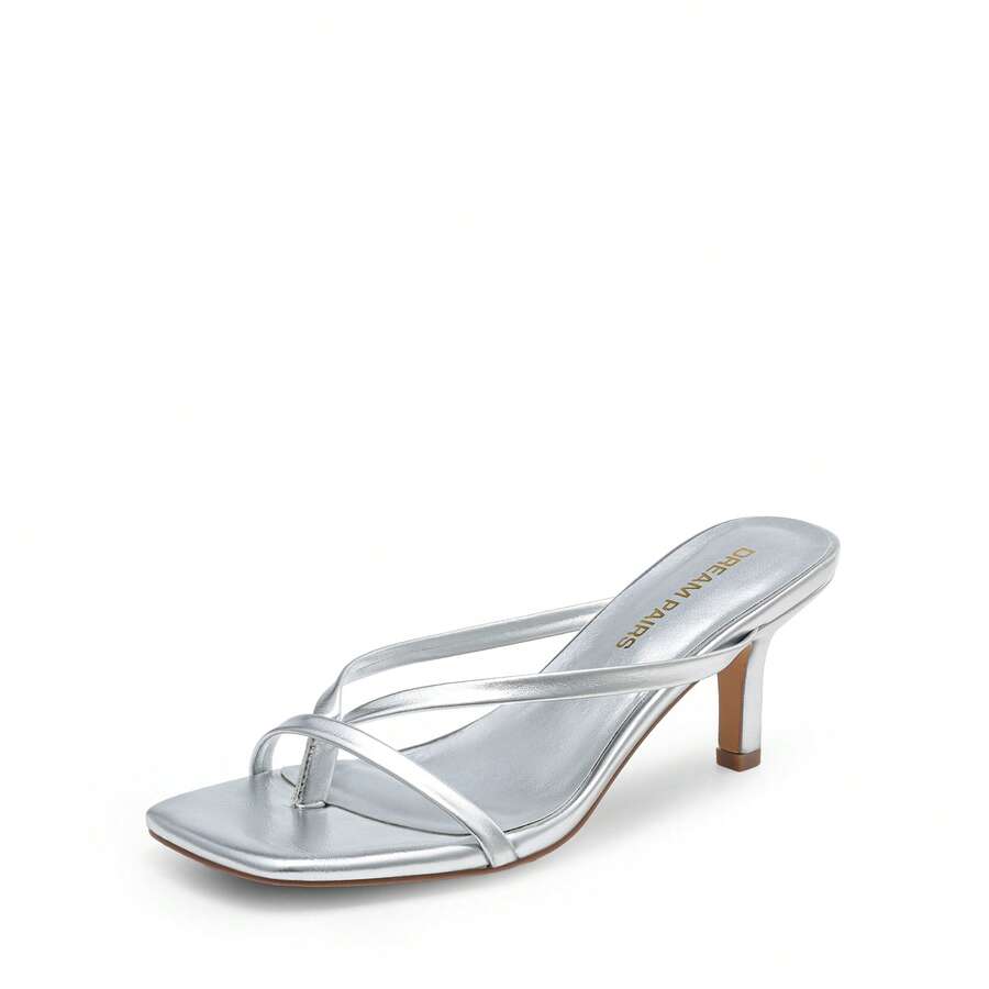 Women's metallic kitten low heel thong sandals featuring an open square toe and slip-on mule design.