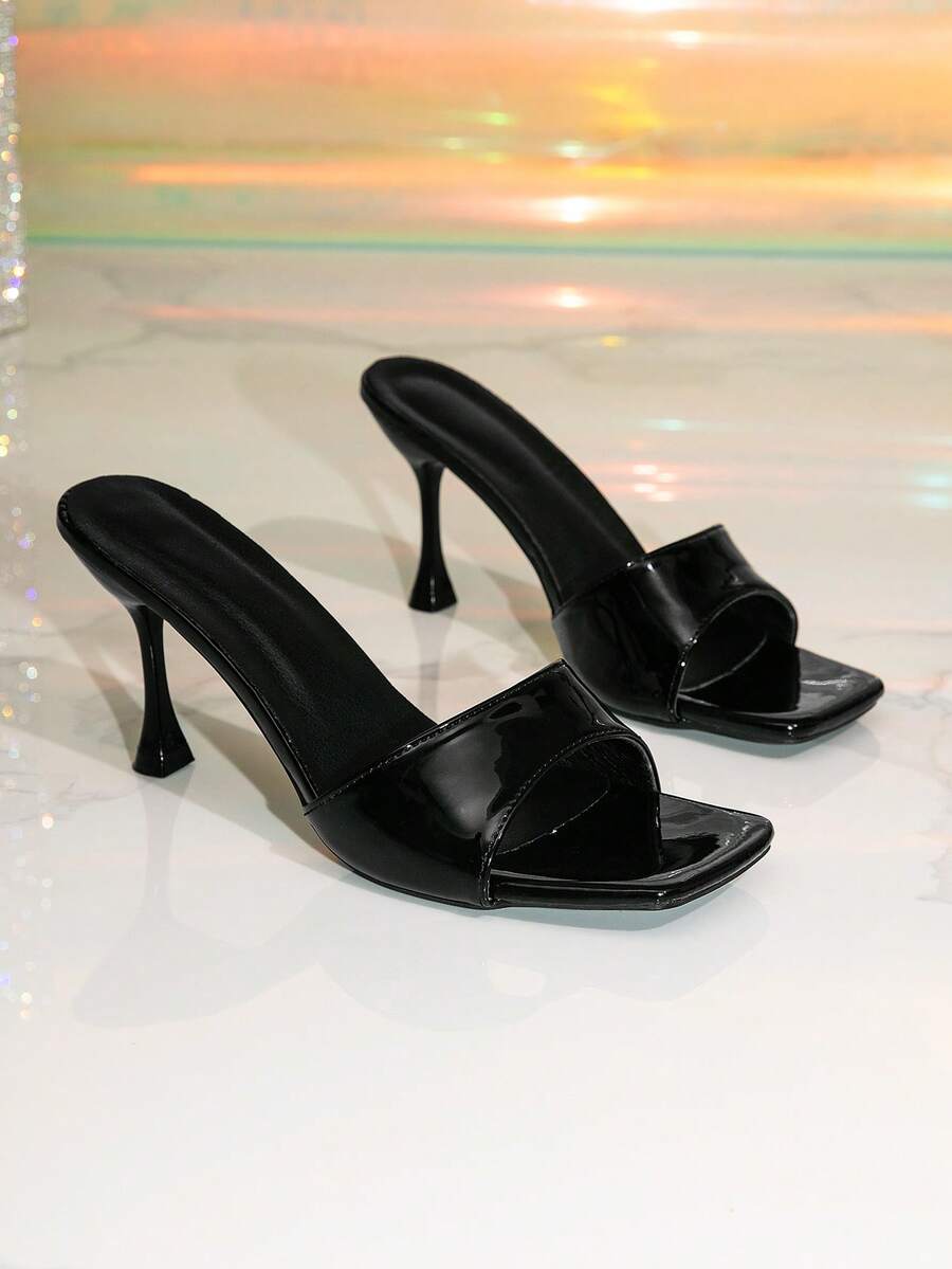 Women's square toe peep toe high heel mule sandals featuring smooth PU leather straps and a pyramid high heel.
