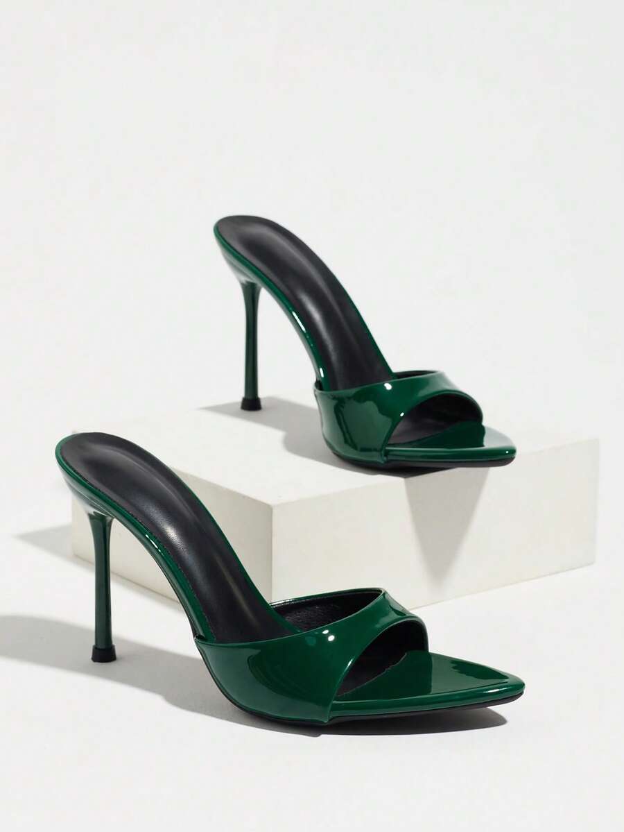 Women's elegant open toe high heel party mules featuring sleek stiletto heels and a slip-on design.