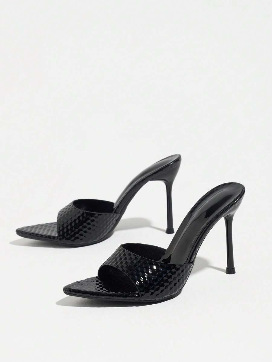 Women's elegant open toe high heel party mules featuring sleek stiletto heels and a slip-on design.