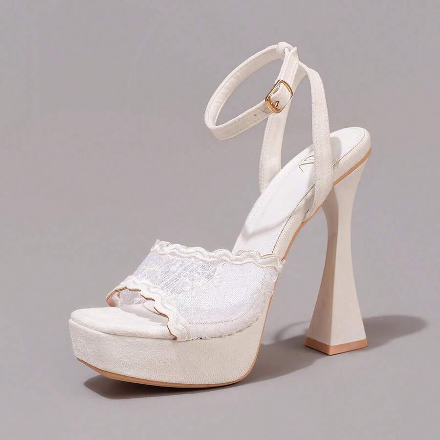 Lace embroidered open toe high heel sandals featuring a chunky square heel, platform wedge, and ankle strap buckle closure.