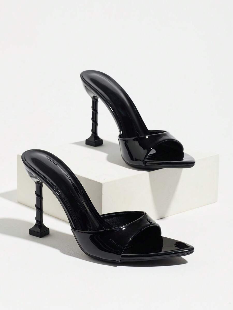Women's elegant open toe high heel party mules featuring sleek stiletto heels and a slip-on design.
