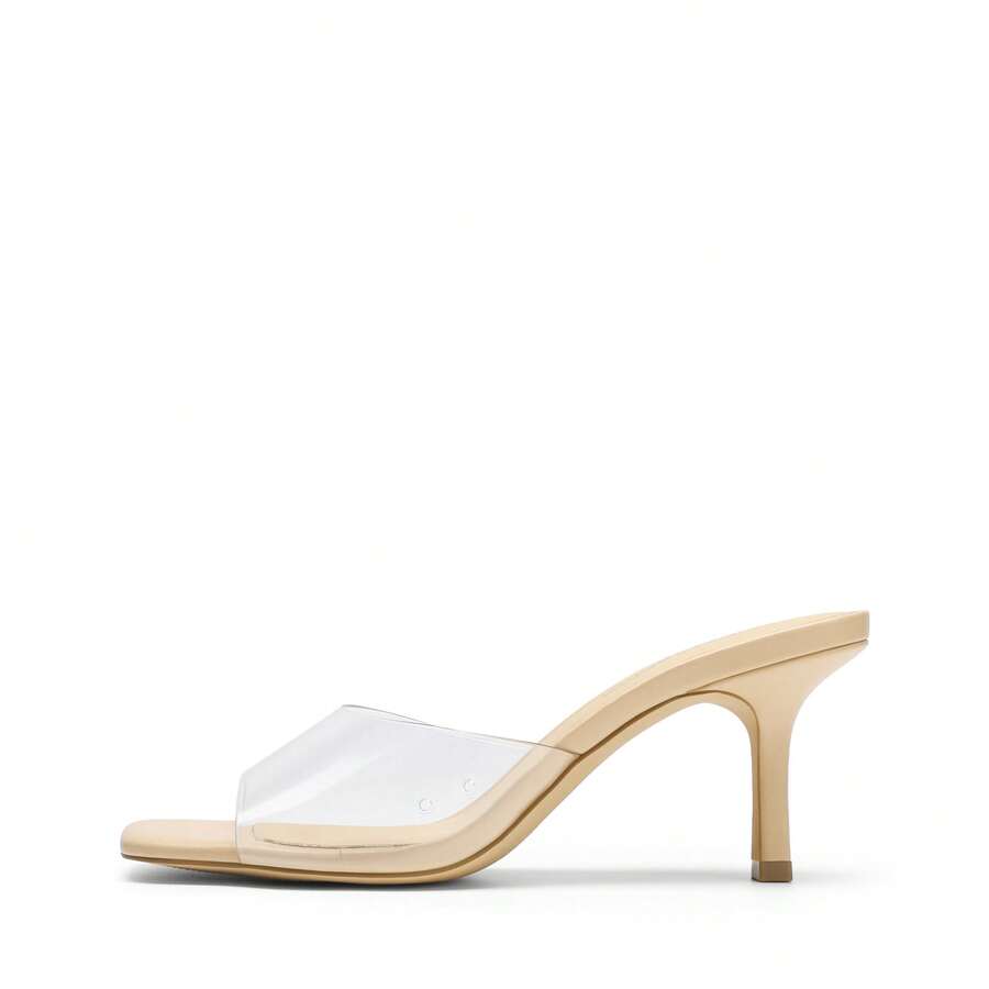 Pair of women's open square toe kitten heel mule sandals in white PU leather with slip-on styling.