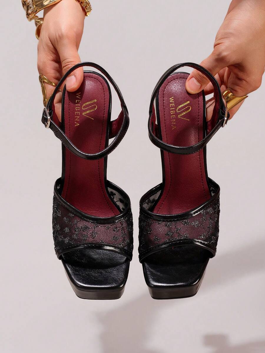 Lace embroidered open toe high heel sandals featuring a chunky square heel, platform wedge, and ankle strap buckle closure.