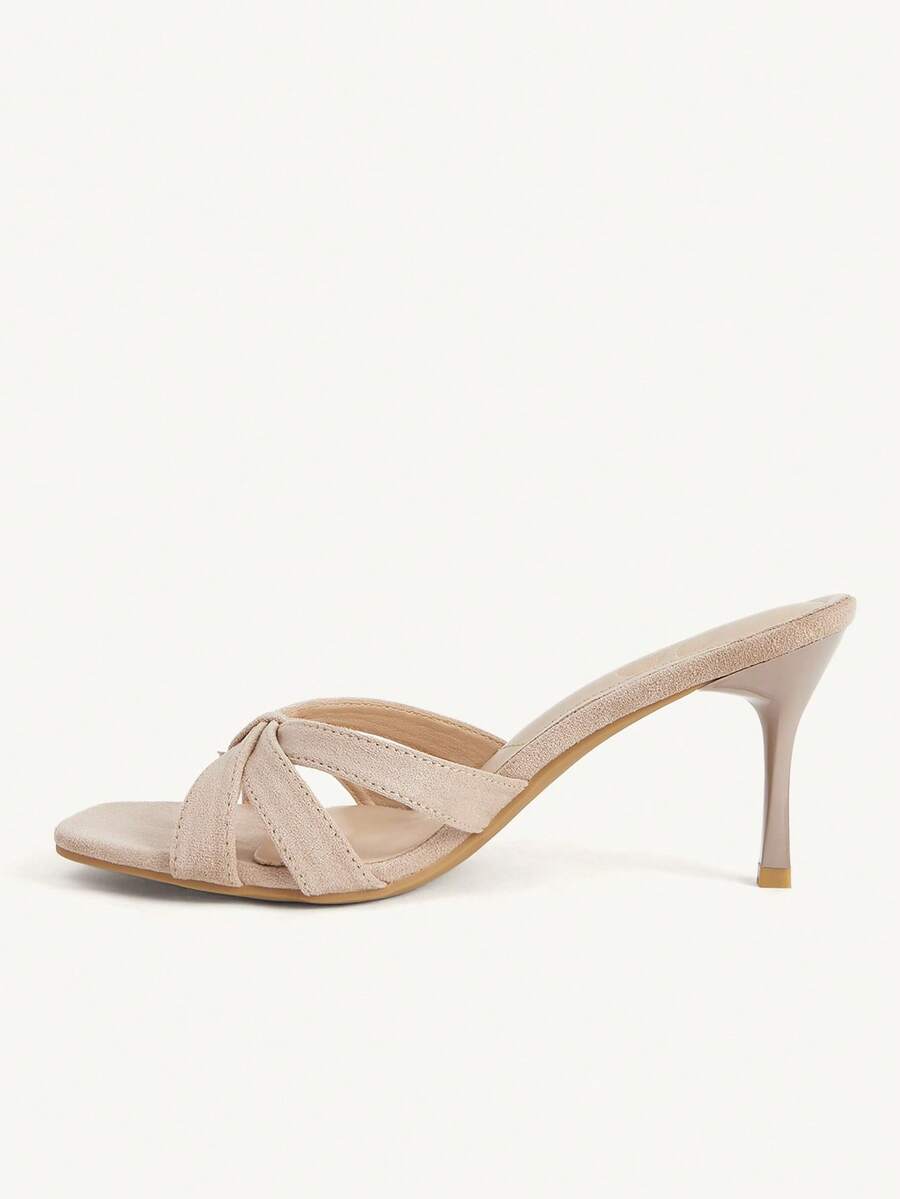 Square toe gold metallic heel sandals for women featuring open toe, crossover slingback strap, and stiletto mid heel for weddings and parties.