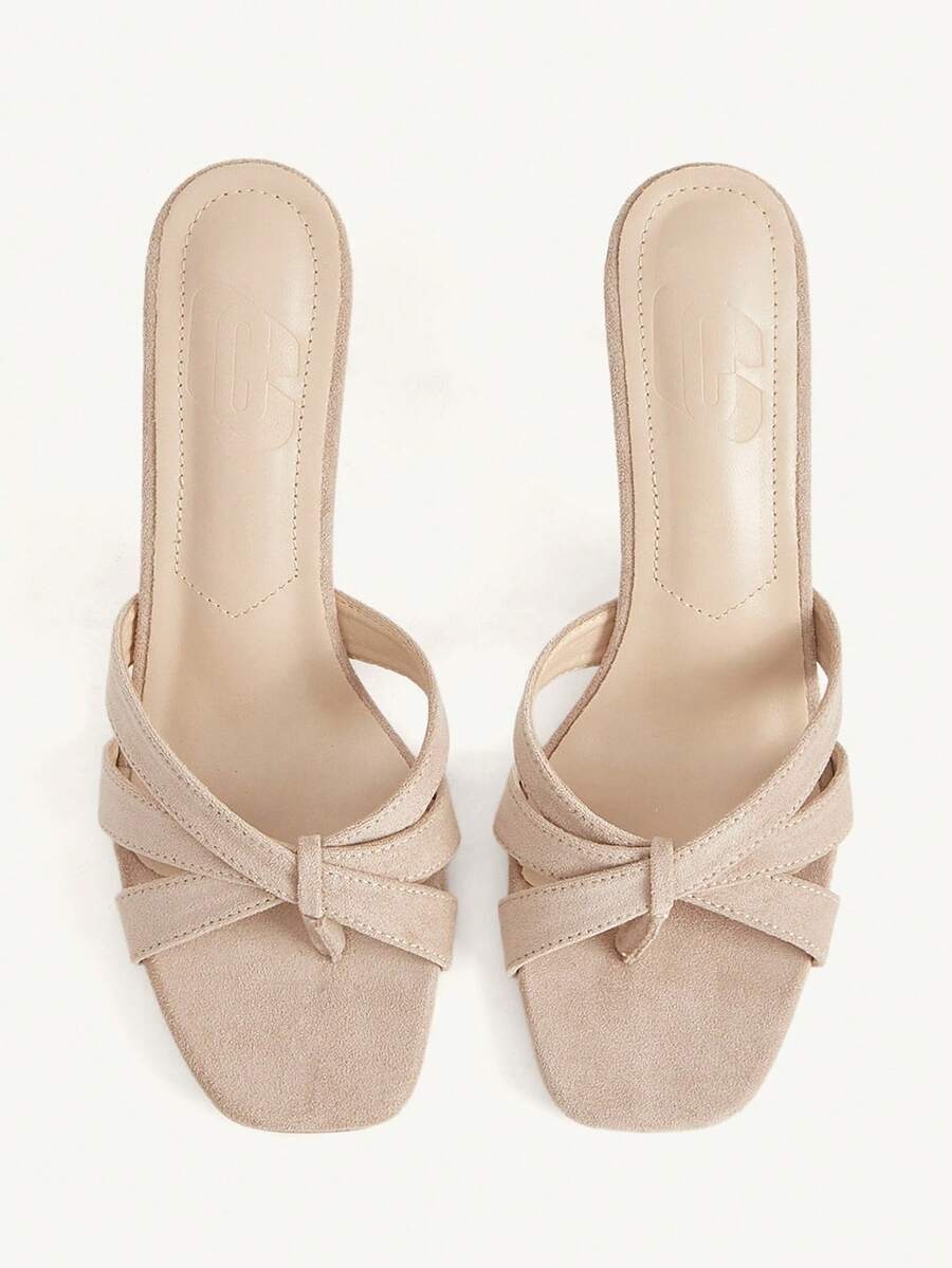 Square toe gold metallic heel sandals for women featuring open toe, crossover slingback strap, and stiletto mid heel for weddings and parties.