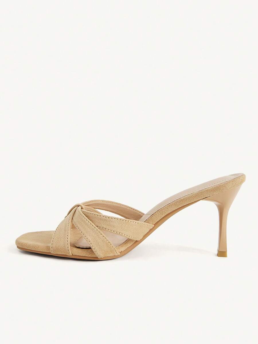 Square toe gold metallic heel sandals for women featuring open toe, crossover slingback strap, and stiletto mid heel for weddings and parties.