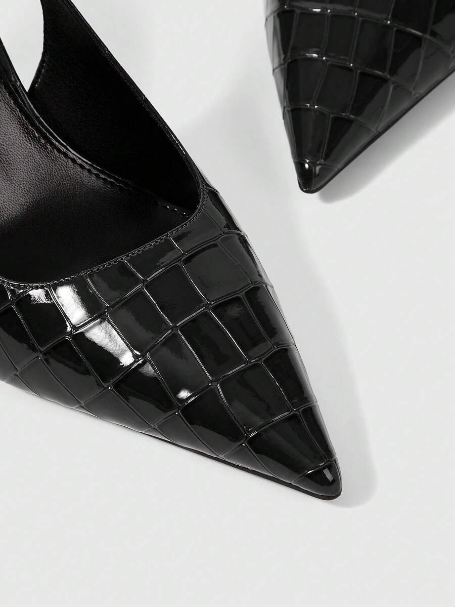 Women's pointed-toe high heel pumps in black mirror PU leather with an ankle strap, stiletto heel, and rhinestone buckle.