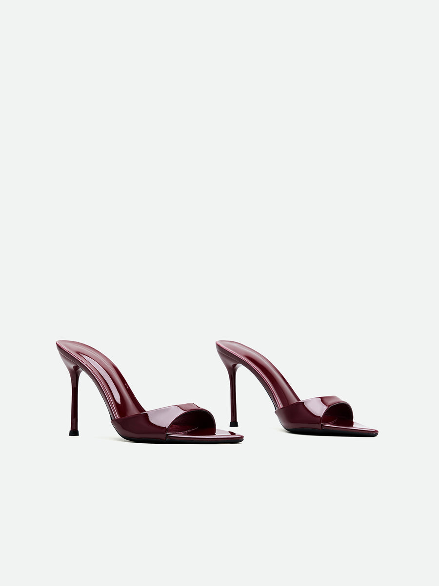 Burgundy women's high heel open-toe mules with stiletto heel and slingback strap designed for evening parties and wedding events.