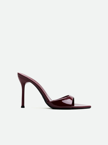 Burgundy women's high heel open-toe mules with stiletto heel and slingback strap designed for evening parties and wedding events.
