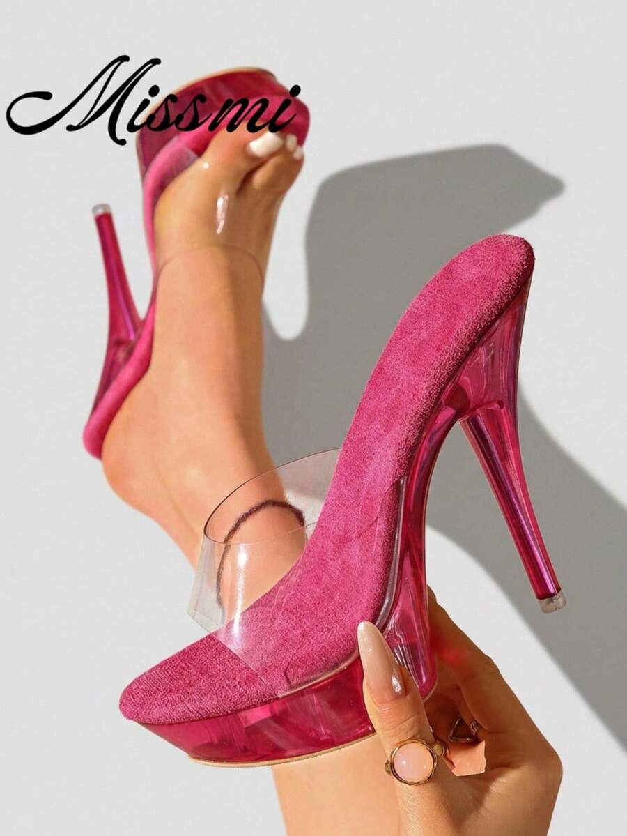 Transparent chunky heel platform slide sandals for women featuring clear PVC upper, open toe design, and ultra high heels.