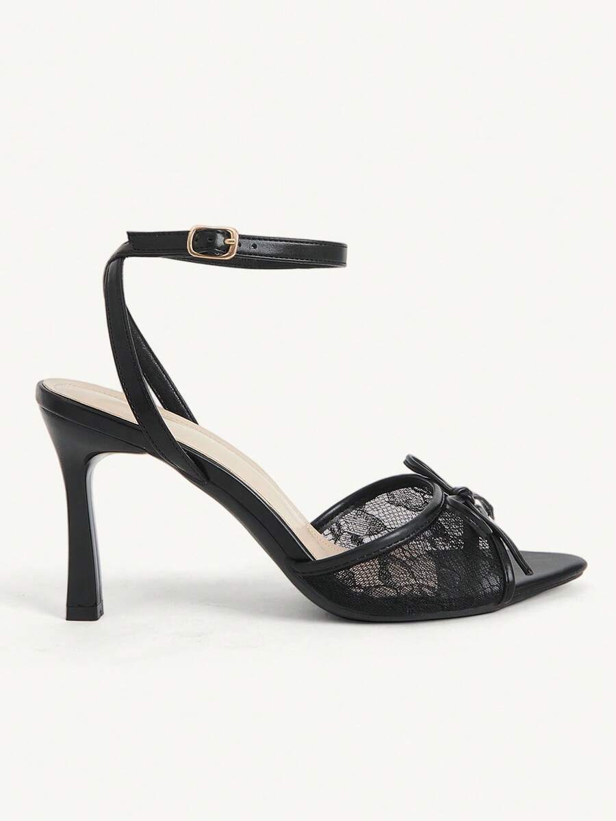 Women's open toe high heel sandals with lace mesh upper, stiletto heel, and ankle strap closure.