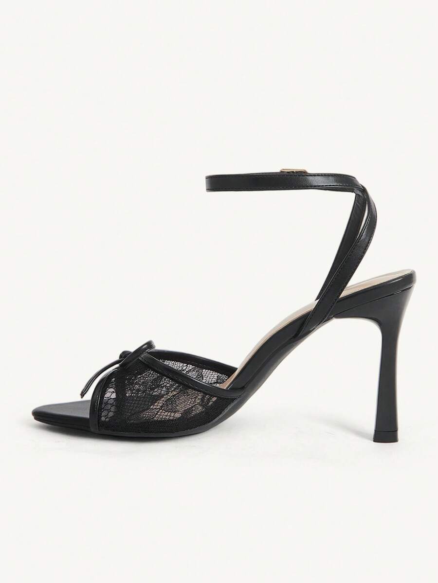 Women's open toe high heel sandals with lace mesh upper, stiletto heel, and ankle strap closure.