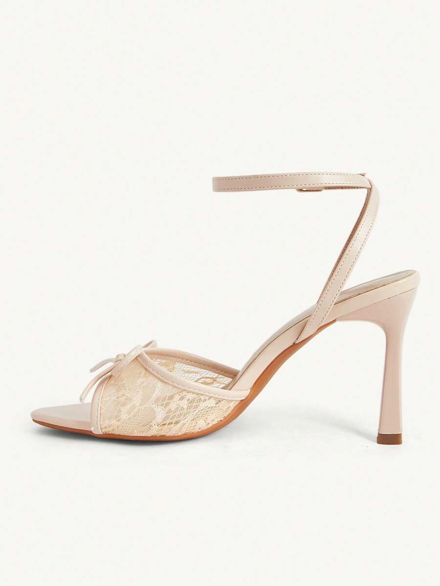 Women's open toe high heel sandals with lace mesh upper, stiletto heel, and ankle strap closure.