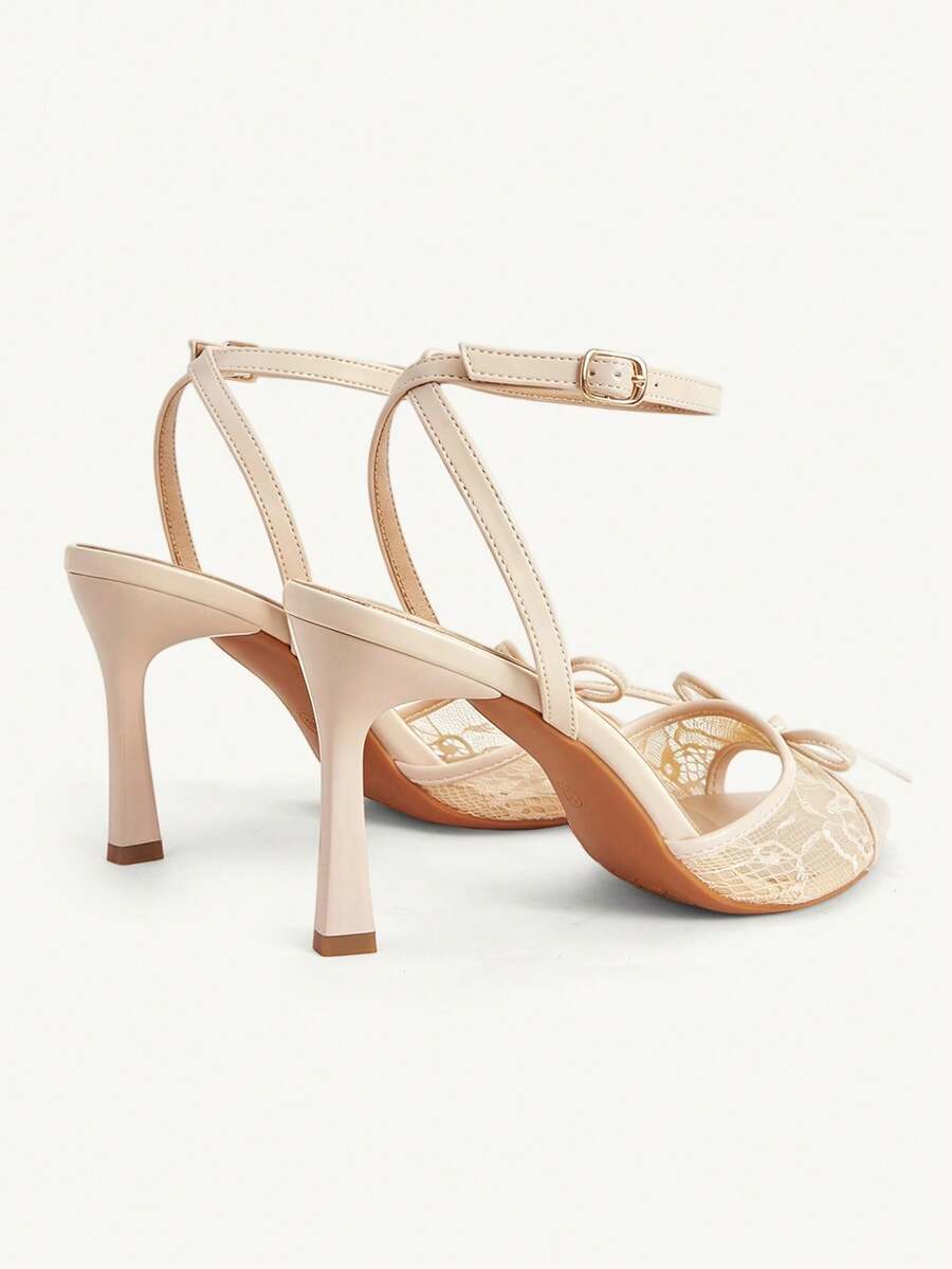 Women's open toe high heel sandals with lace mesh upper, stiletto heel, and ankle strap closure.
