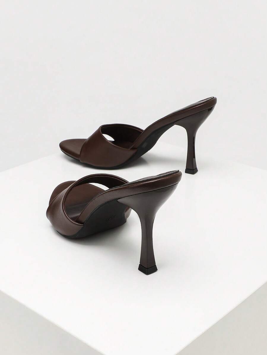 Women's open toe high heel sandals with slingback strap and sleek stiletto heel in smooth PU leather.