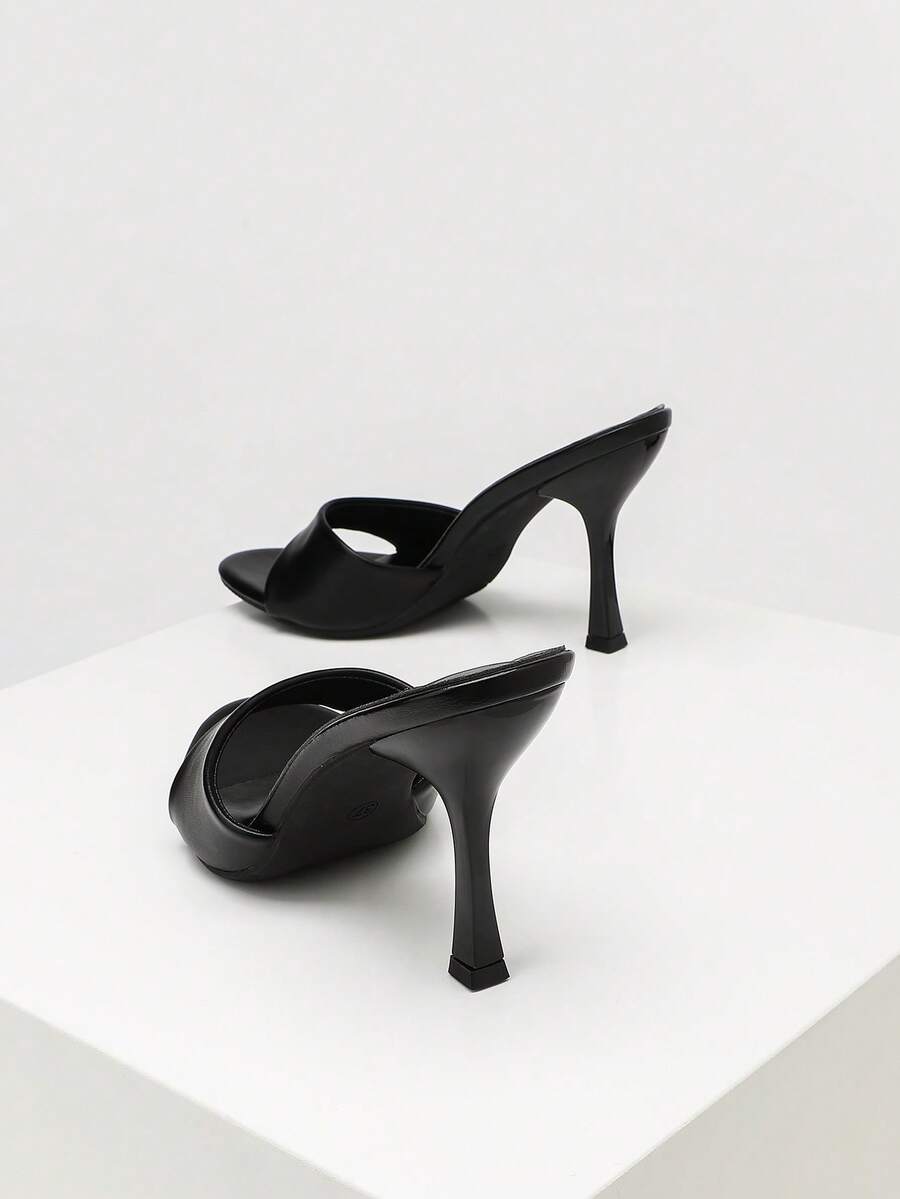 Women's open toe high heel sandals with slingback strap and sleek stiletto heel in smooth PU leather.