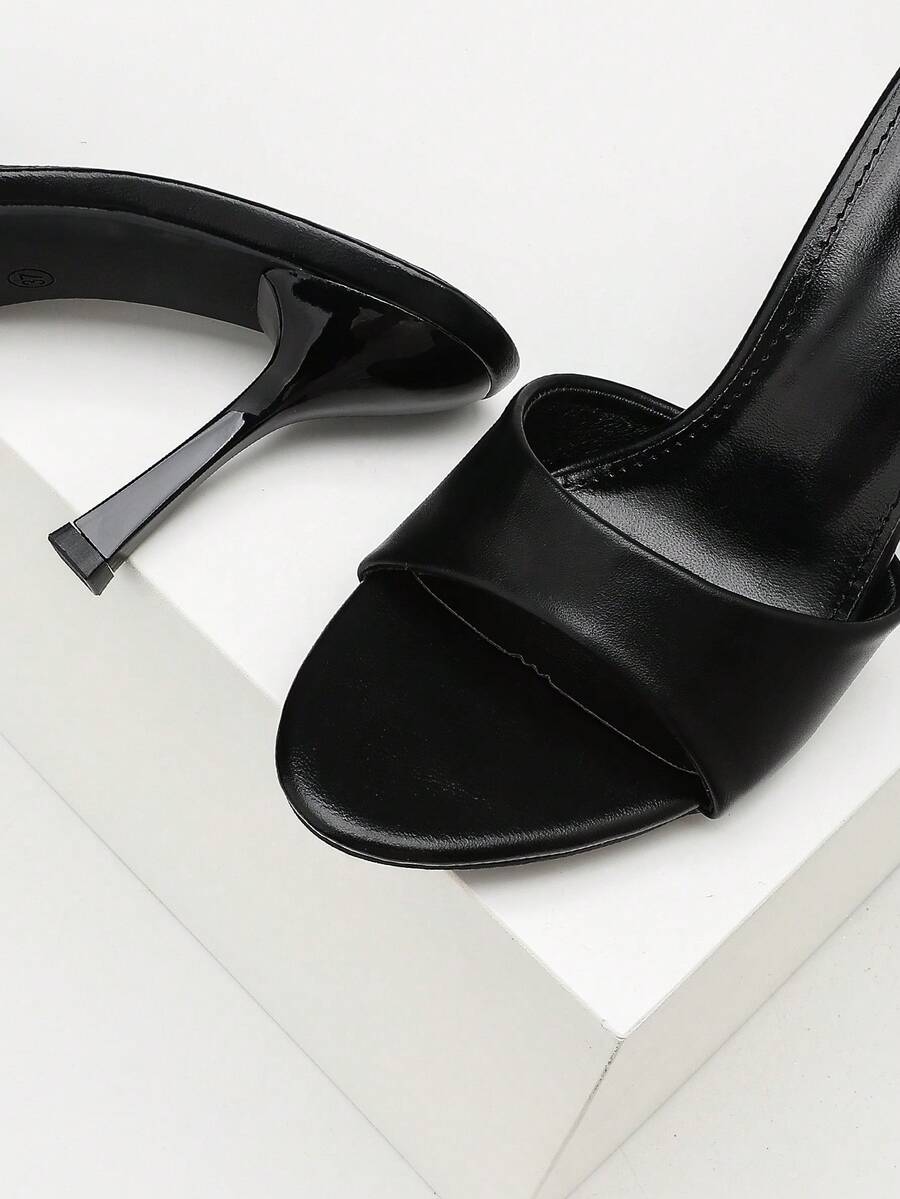 Women's open toe high heel sandals with slingback strap and sleek stiletto heel in smooth PU leather.