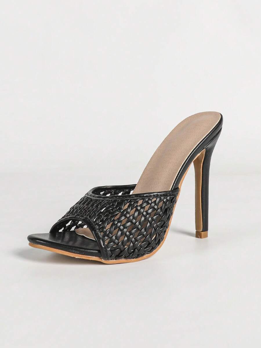 Women's black patent strap pointed toe high heel sandals featuring a stiletto heel and open hollow-out slingback design.
