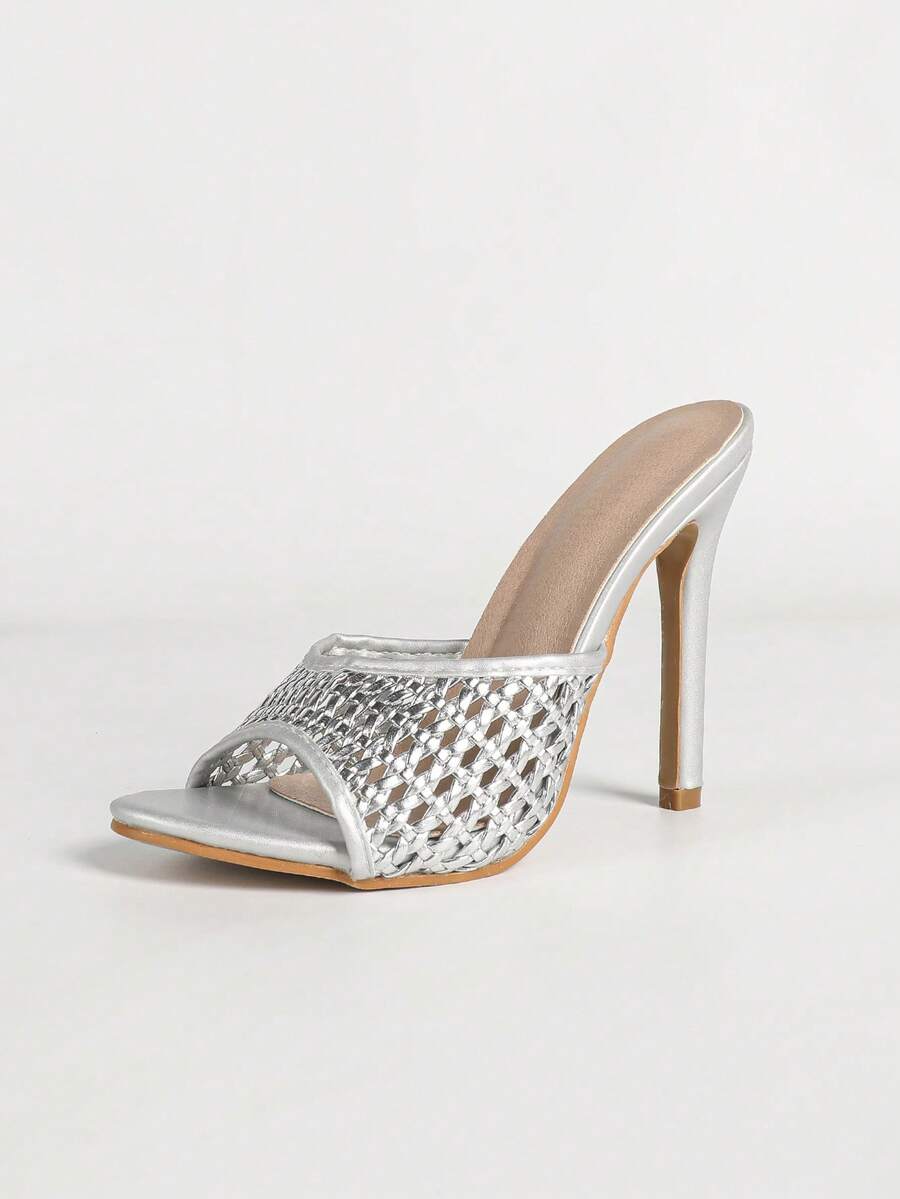 Women's black patent strap pointed toe high heel sandals featuring a stiletto heel and open hollow-out slingback design.