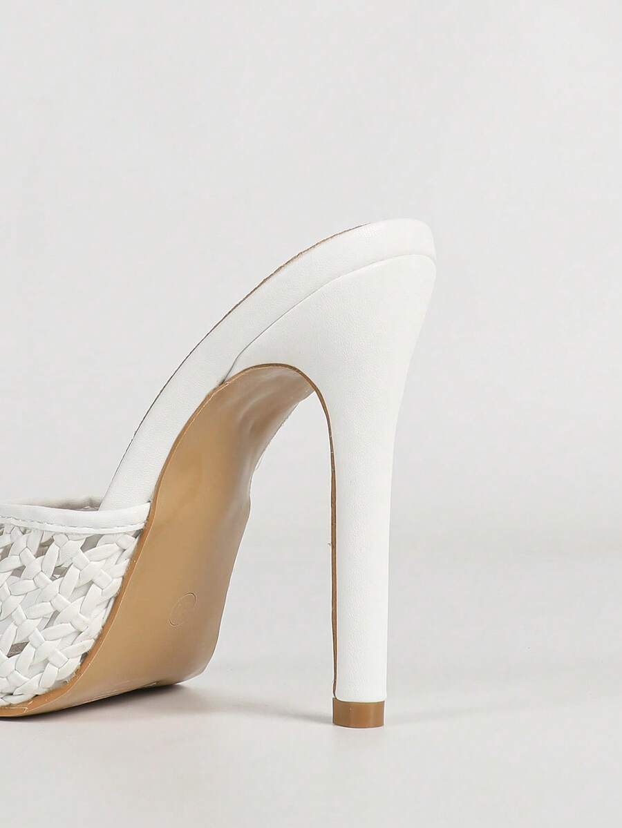 Women's black patent strap pointed toe high heel sandals featuring a stiletto heel and open hollow-out slingback design.