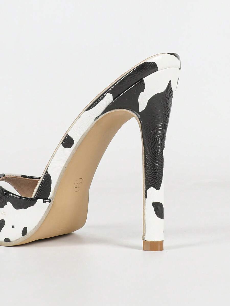 Women's black patent strap pointed toe high heel sandals featuring a stiletto heel and open hollow-out slingback design.