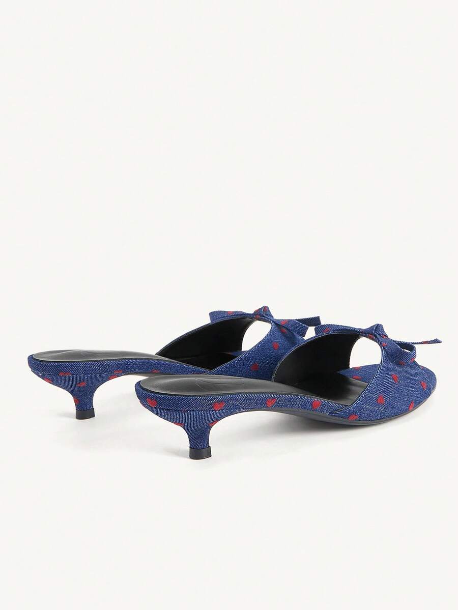 Burgundy high heel sandals for women featuring an open toe, decorative bow, 5.5cm kitten heel, and slingback strap.