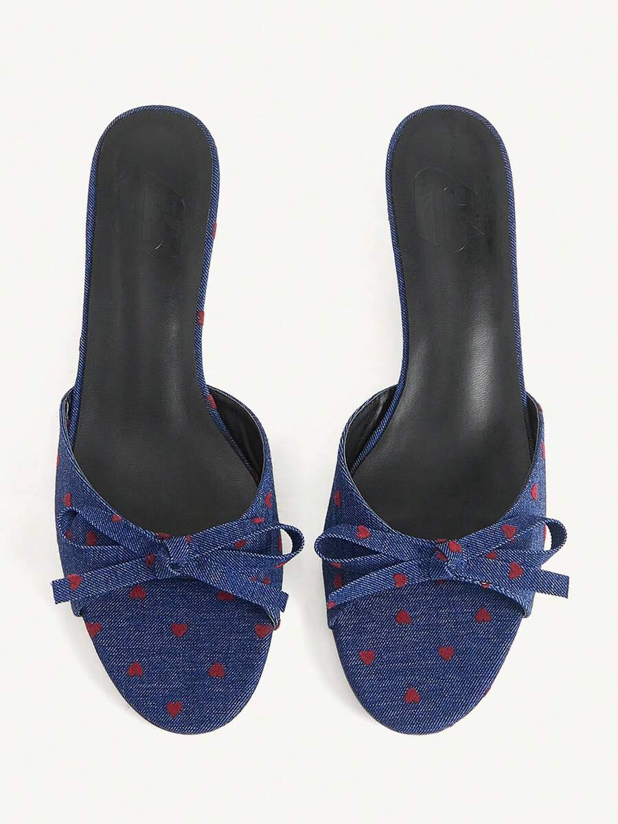 Burgundy high heel sandals for women featuring an open toe, decorative bow, 5.5cm kitten heel, and slingback strap.