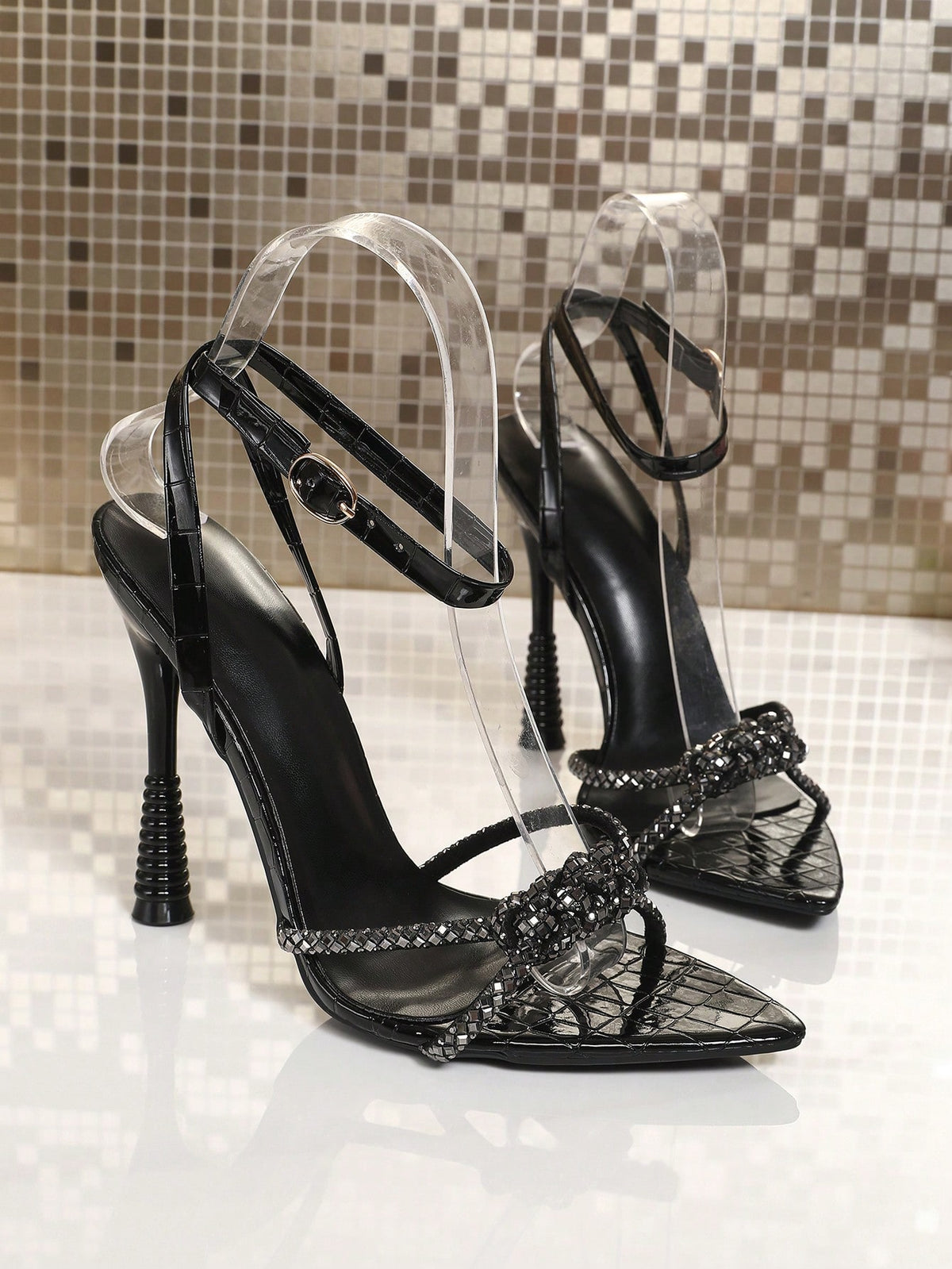Women's peep toe stiletto high heel strappy sandals with rhinestone accents and slip-on design.