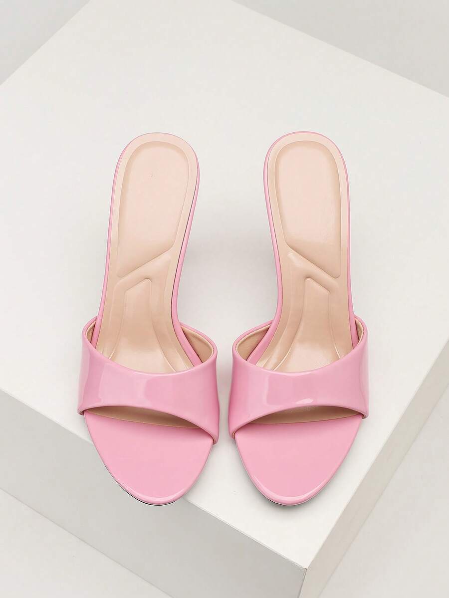 Mauve purple open toe stiletto high heels slippers for women suitable for parties and evening wear.