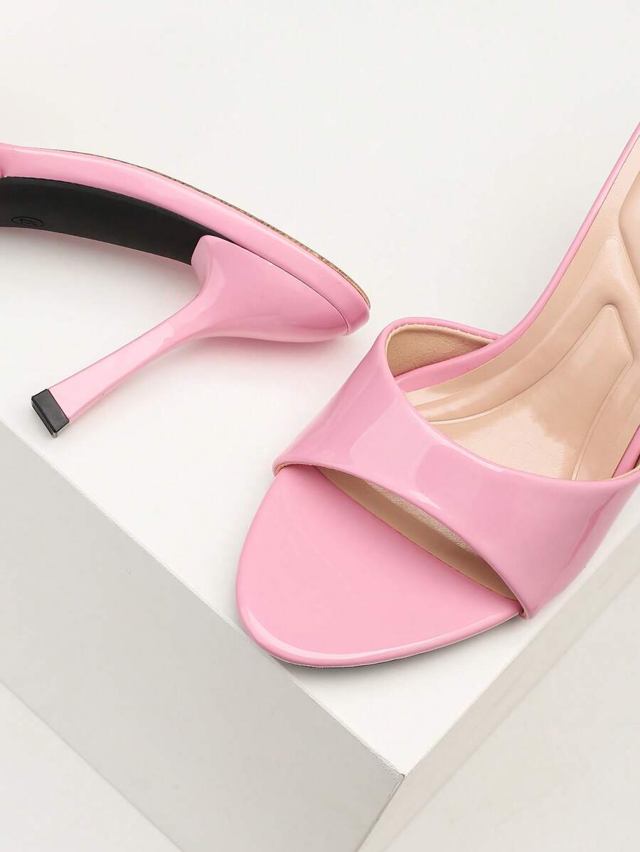 Mauve purple open toe stiletto high heels slippers for women suitable for parties and evening wear.