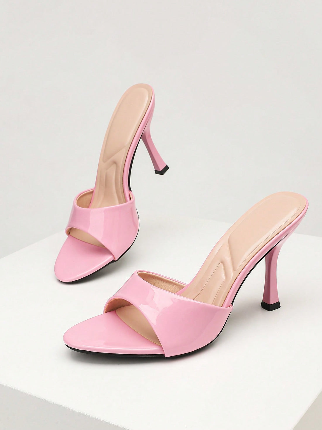 Mauve purple open toe stiletto high heels slippers for women suitable for parties and evening wear.