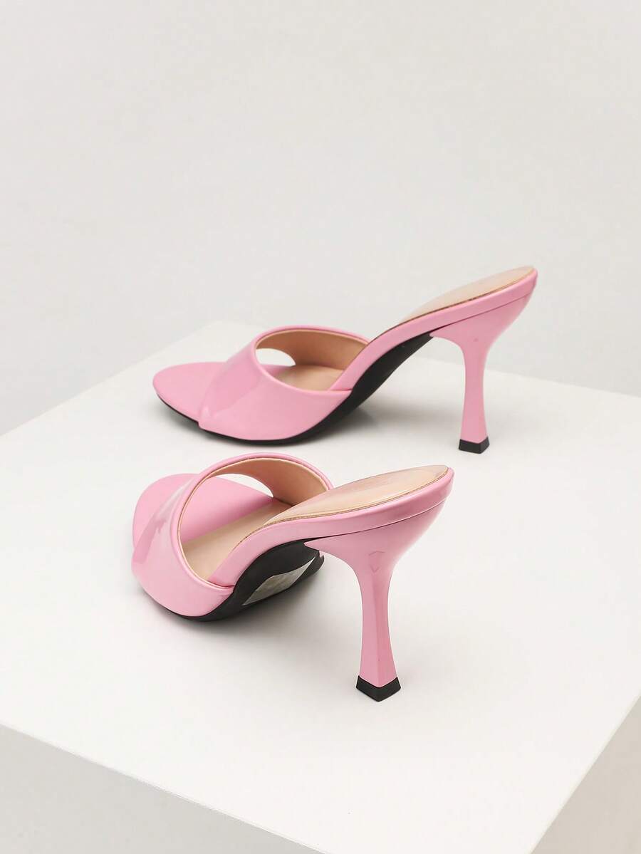 Mauve purple open toe stiletto high heels slippers for women suitable for parties and evening wear.