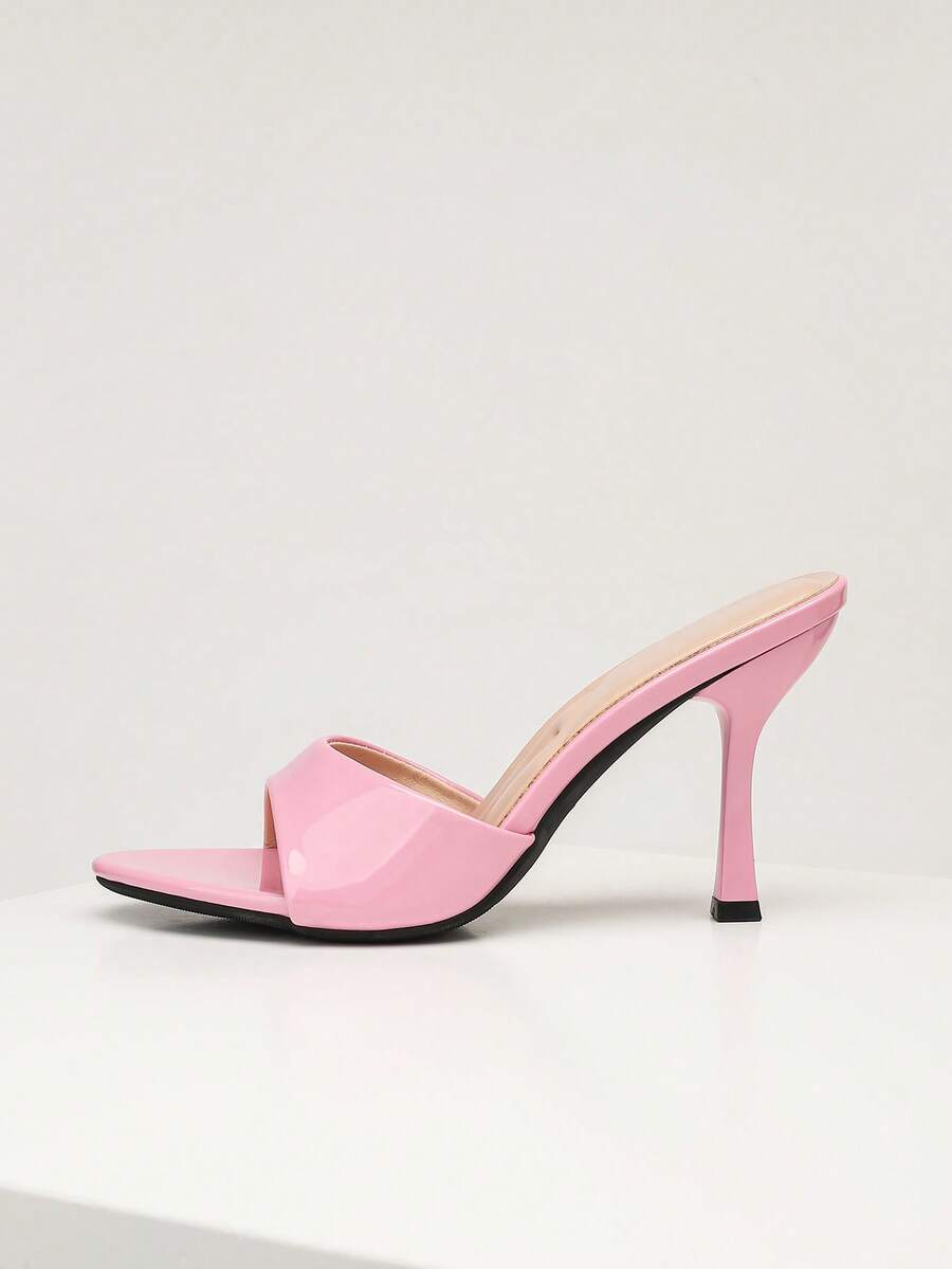 Mauve purple open toe stiletto high heels slippers for women suitable for parties and evening wear.