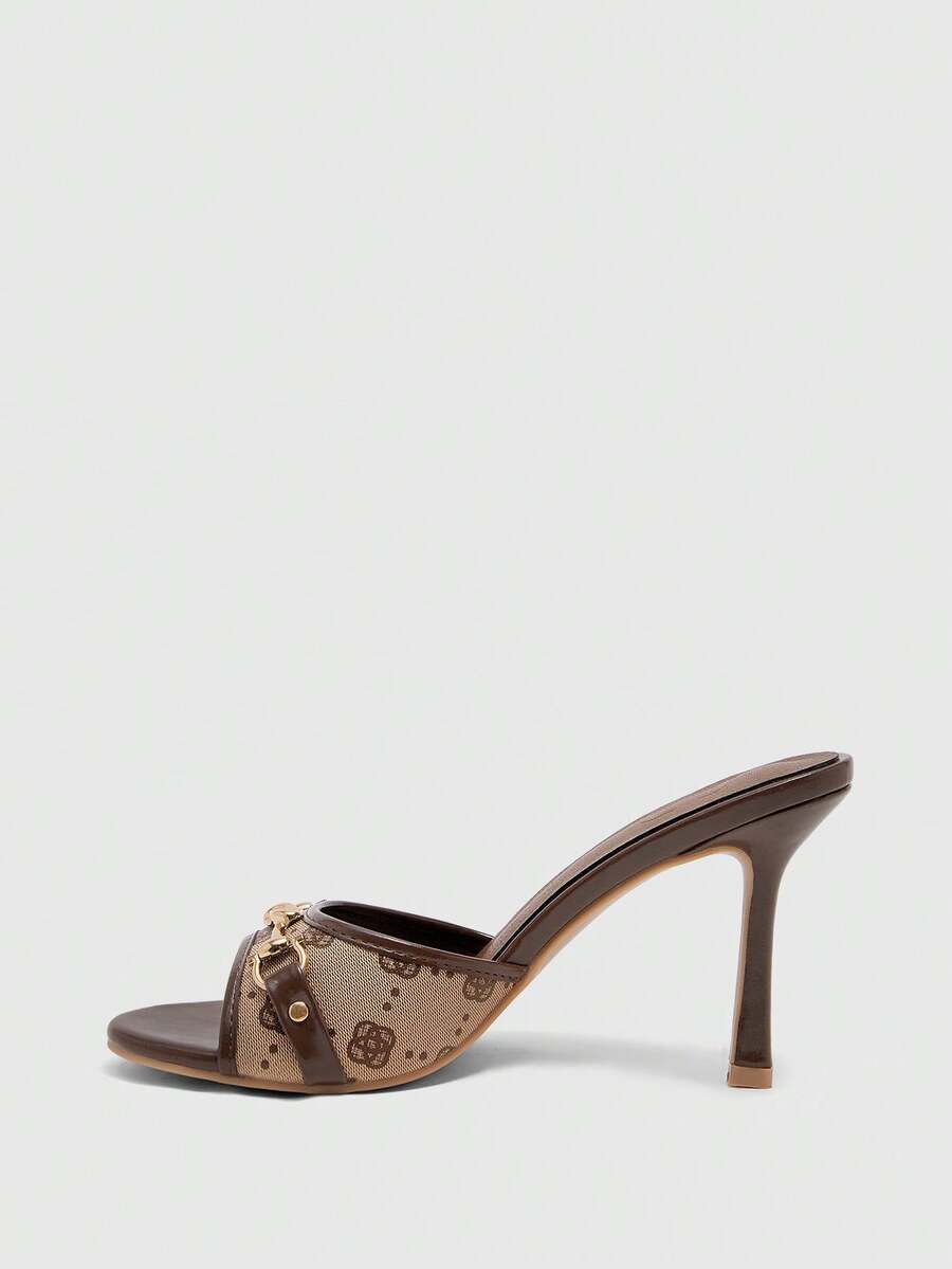 Women's beige high heel mule sandals with open round toe and metal chain detail