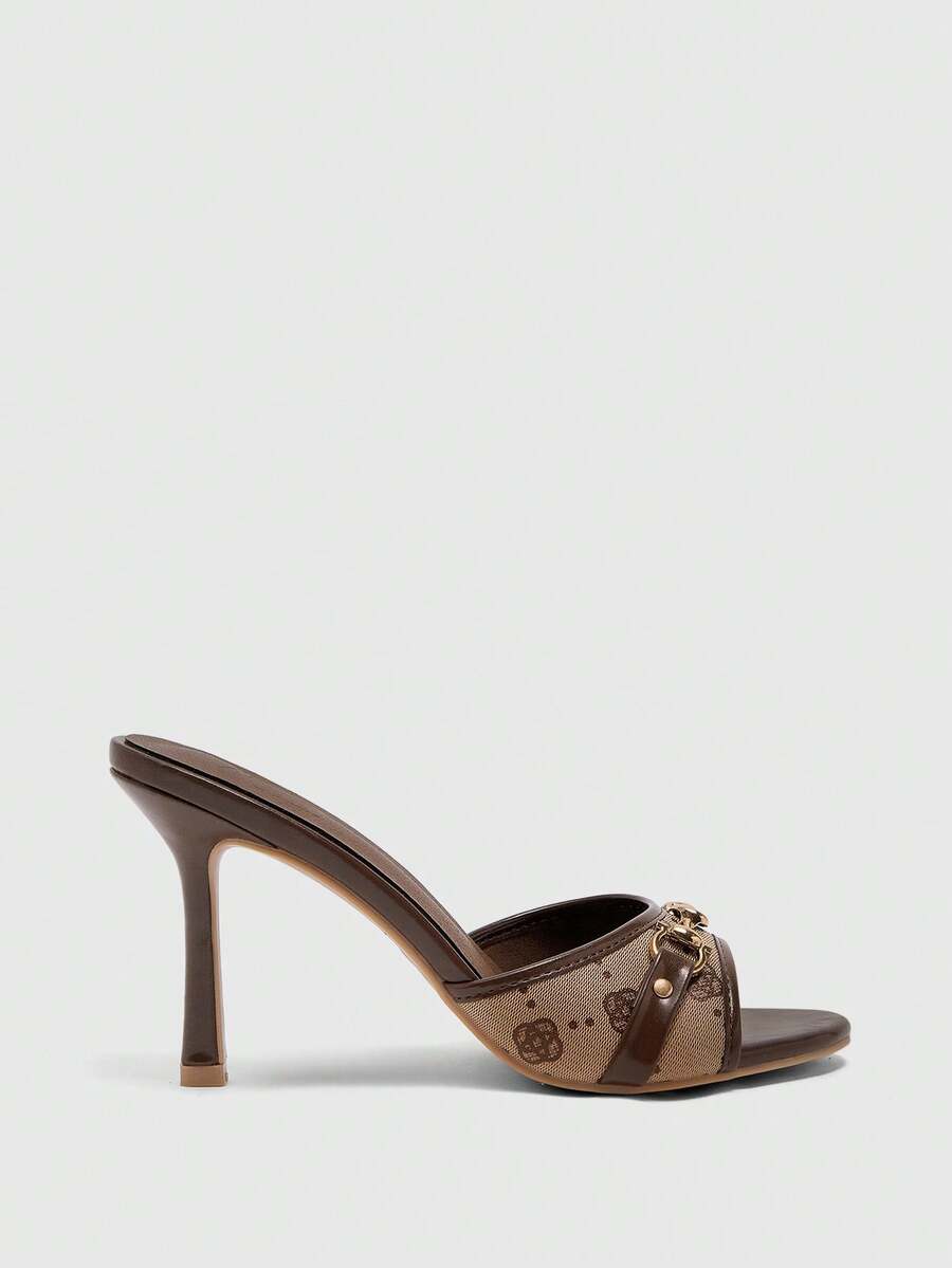 Women's beige high heel mule sandals with open round toe and metal chain detail