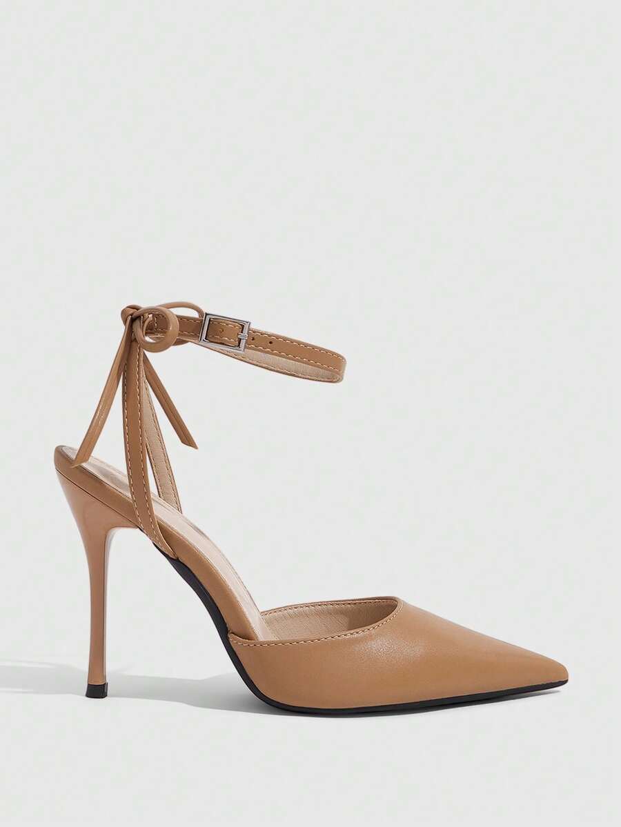 Women's pointed toe ankle strap stiletto high heel pumps featuring smooth PU leather and delicate buckle closure