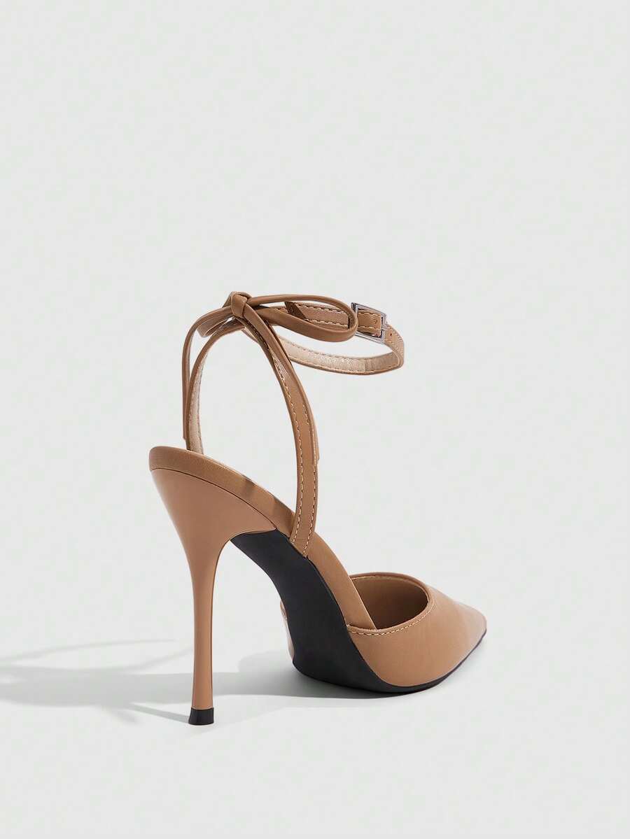 Women's pointed toe ankle strap stiletto high heel pumps featuring smooth PU leather and delicate buckle closure