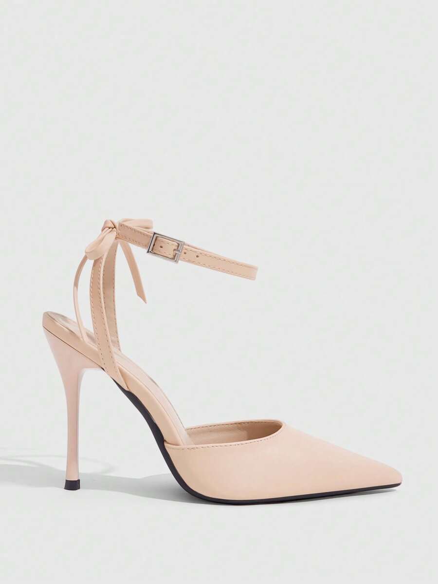 Women's pointed toe ankle strap stiletto high heel pumps featuring smooth PU leather and delicate buckle closure