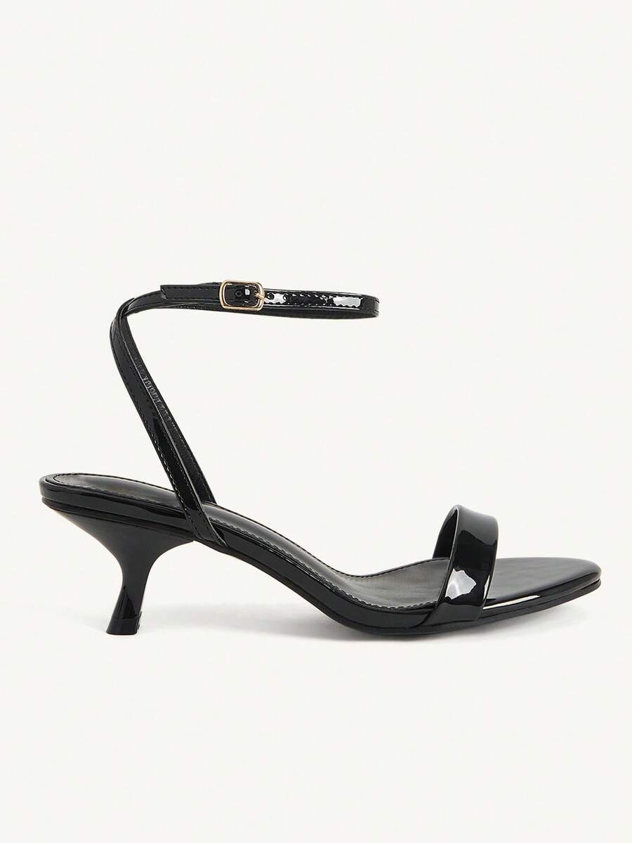 Women's open-toed high-heeled sandals featuring a 5.5cm kitten heel stiletto, sleek ankle strap with buckle closure, and smooth PU leather finish.