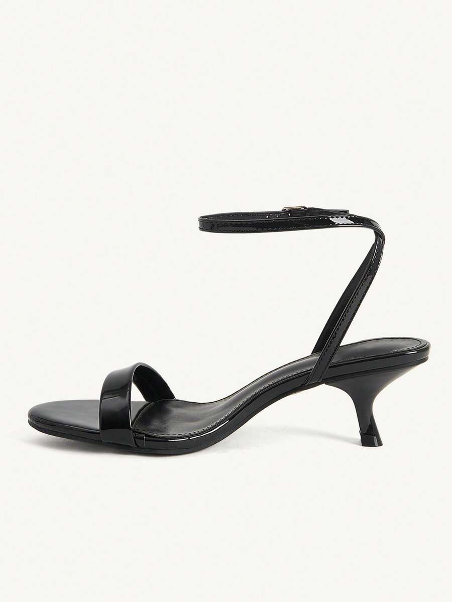 Women's open-toed high-heeled sandals featuring a 5.5cm kitten heel stiletto, sleek ankle strap with buckle closure, and smooth PU leather finish.