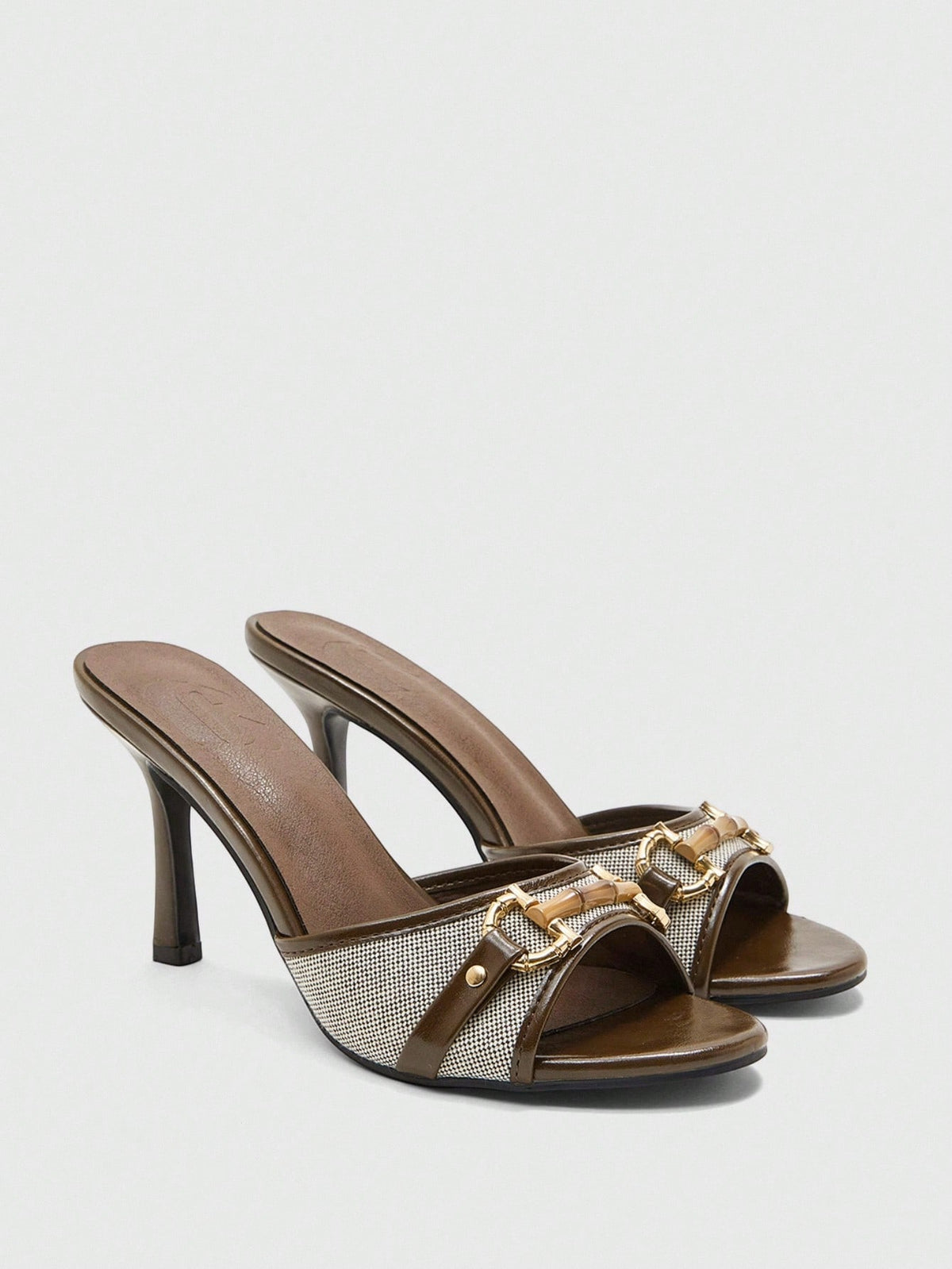Women's beige high heel mule sandals with open round toe and metal chain detail