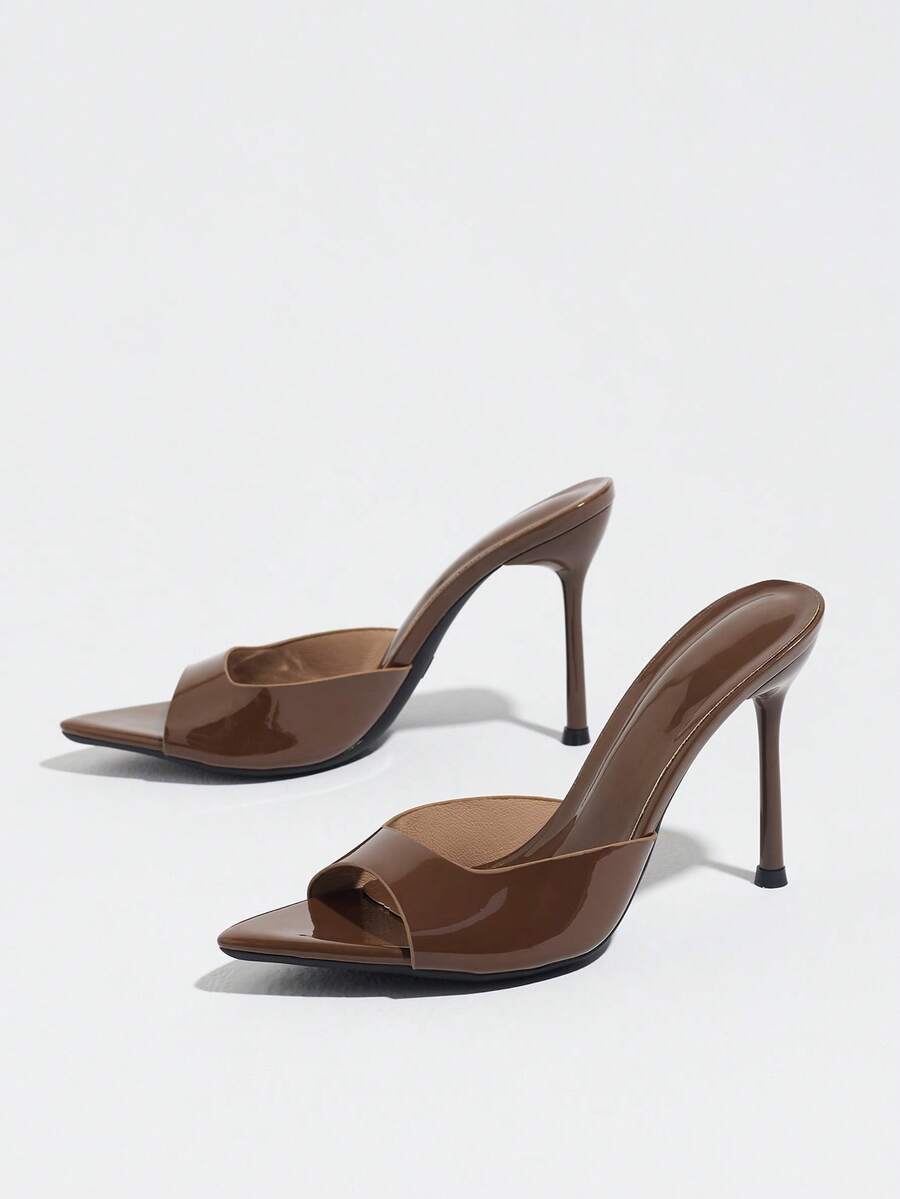 Women's coffee brown high heel mule shoes featuring a glossy mirror finish, open toe design, and sleek stiletto heel.