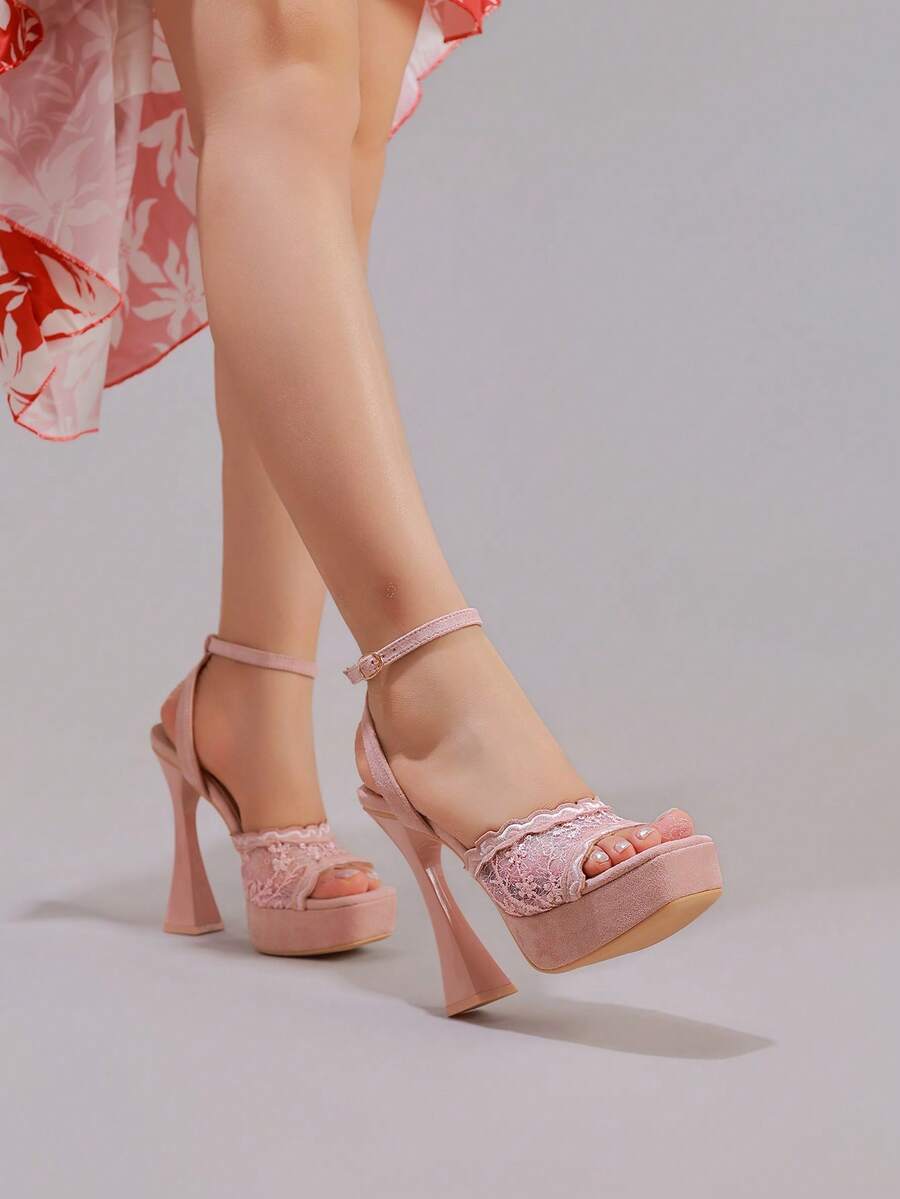 Lace embroidered open toe high heel sandals featuring a chunky square heel, platform wedge, and ankle strap buckle closure.