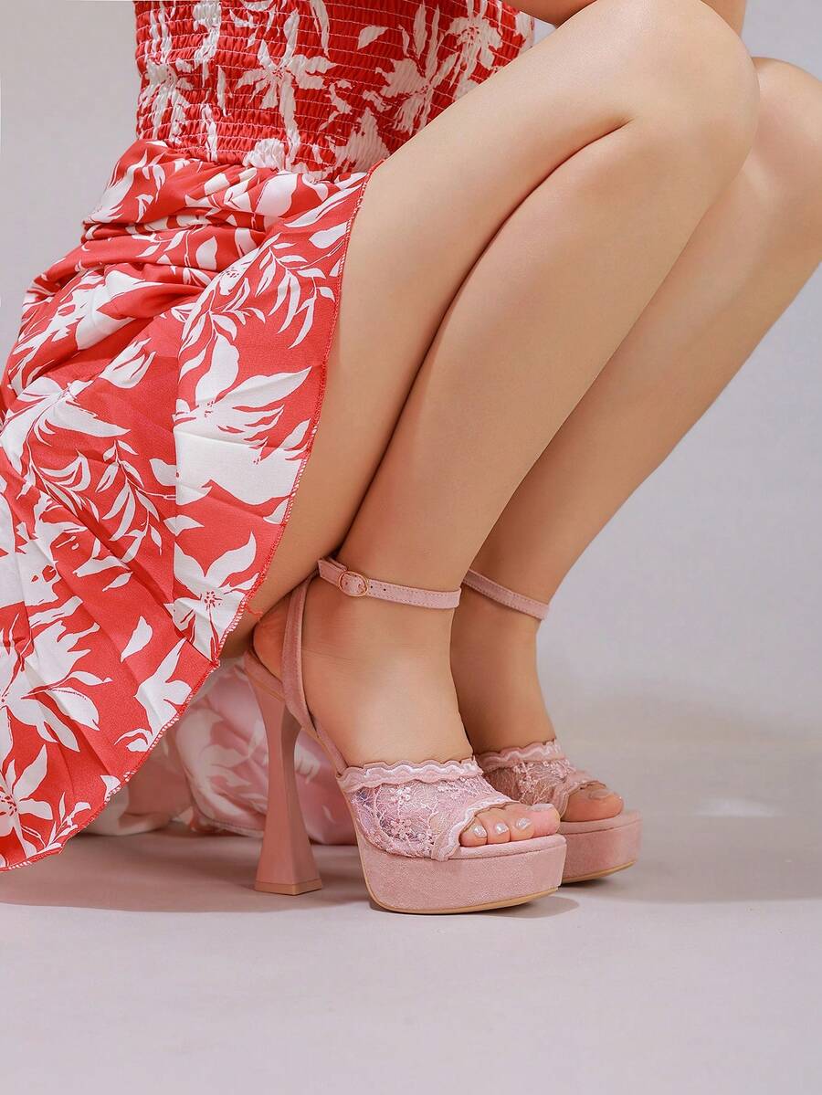 Lace embroidered open toe high heel sandals featuring a chunky square heel, platform wedge, and ankle strap buckle closure.