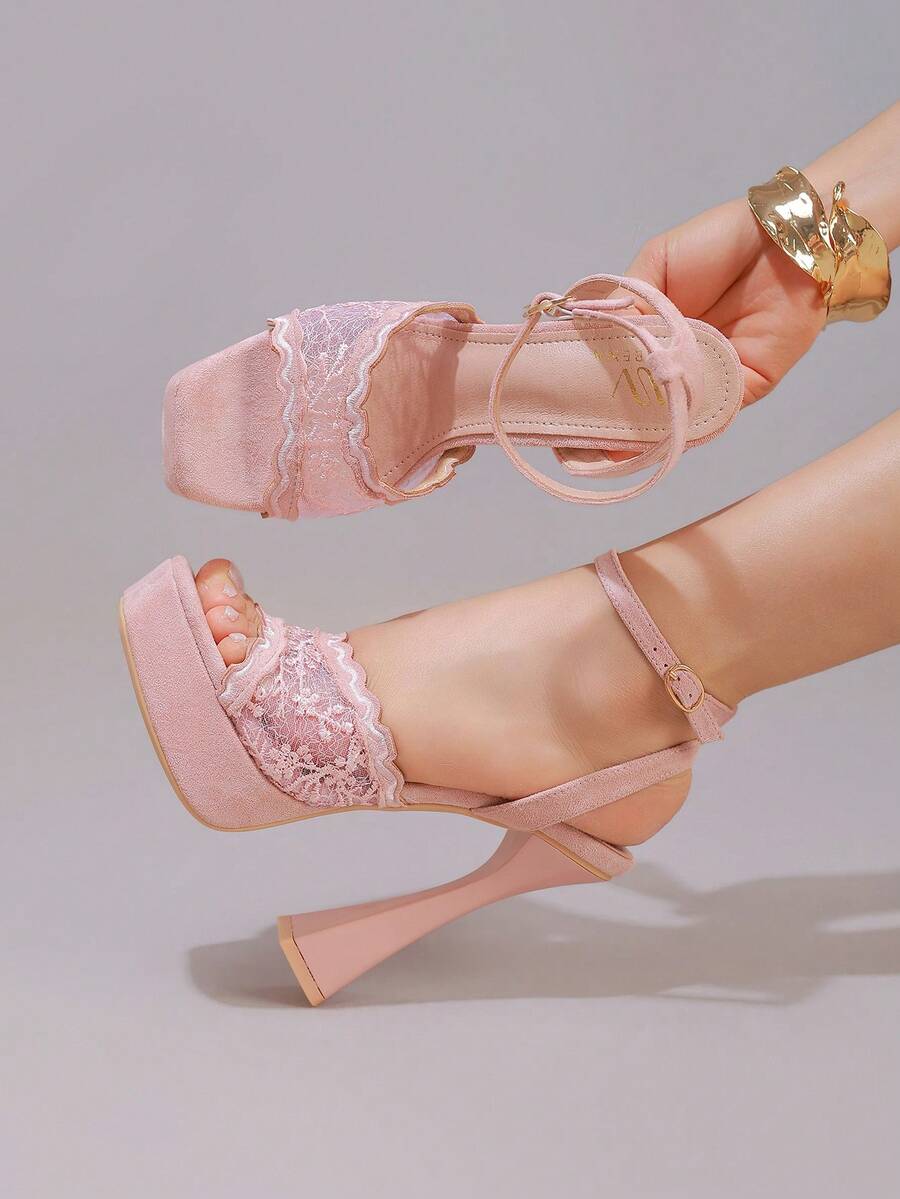 Lace embroidered open toe high heel sandals featuring a chunky square heel, platform wedge, and ankle strap buckle closure.