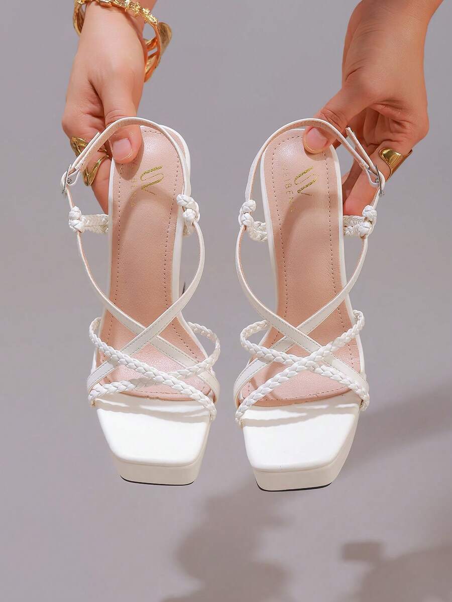Lace embroidered open toe high heel sandals featuring a chunky square heel, platform wedge, and ankle strap buckle closure.