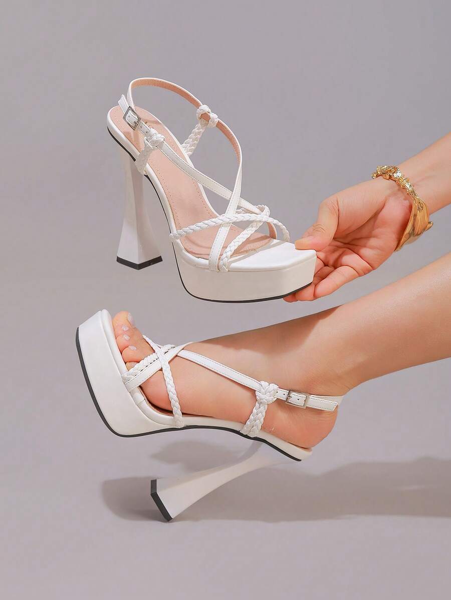 Lace embroidered open toe high heel sandals featuring a chunky square heel, platform wedge, and ankle strap buckle closure.